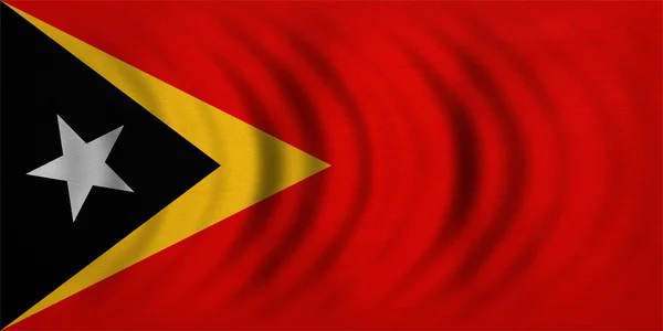 Bandera de Timor Oriental ondulada, textura detallada de la tela —  Fotos de Stock