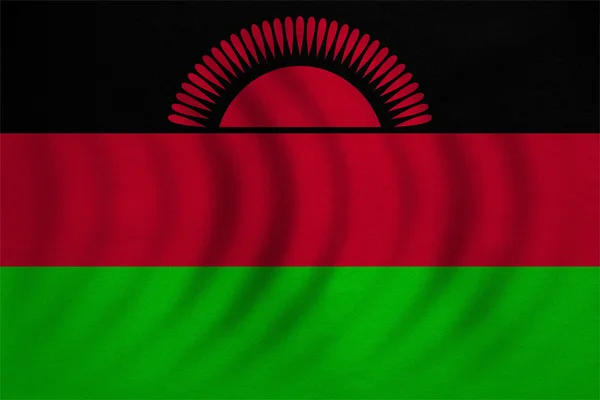 Bandeira do Malawi ondulada, textura de tecido real detalhado — Fotografia de Stock