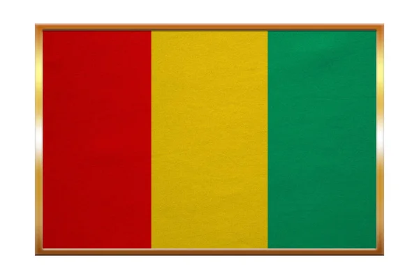 Vlajka Guiney, zlatý rám, textilie textura — Stock fotografie