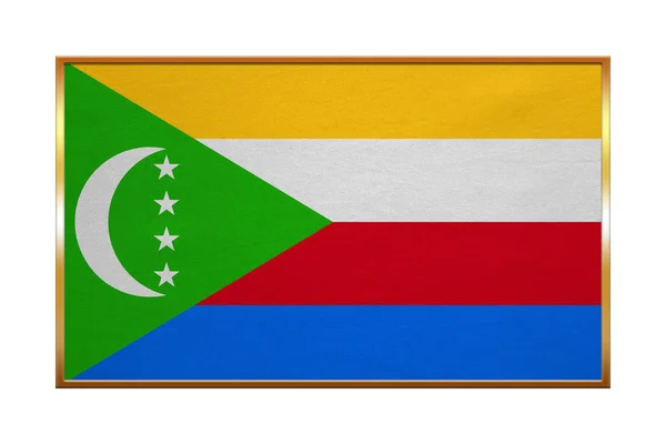 A Comore-szigetek arany keretben, szövet szerkezete zászlaja — Stock Fotó