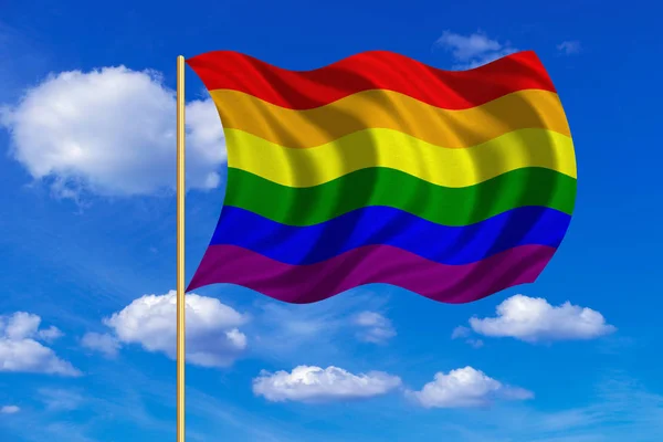 Regnbågsflaggan gay pride vågig på blå himmel bakgrund — Stockfoto