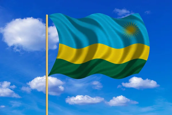 Flagge Ruandas weht auf blauem Himmel — Stockfoto
