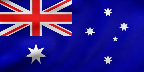 Flagga Australien viftande, riktiga tyg konsistens — Stockfoto