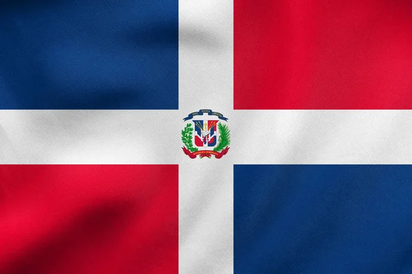 Bandera de República Dominicana ondeando textura de tela real —  Fotos de Stock
