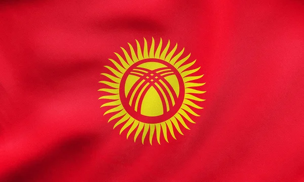 Flag of Kyrgyzstan waving, real fabric texture — Stock Photo, Image