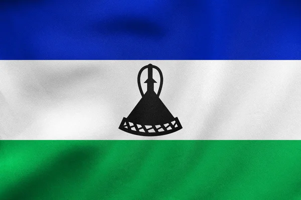 Lesotho integetett, valós szövet szerkezete zászlaja — Stock Fotó