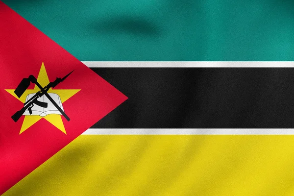 Bandeira de Moçambique acenando, textura de tecido real — Fotografia de Stock