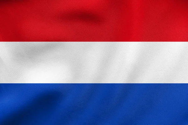 Bandiera dei Paesi Bassi sventola texture tessuto reale — Foto Stock