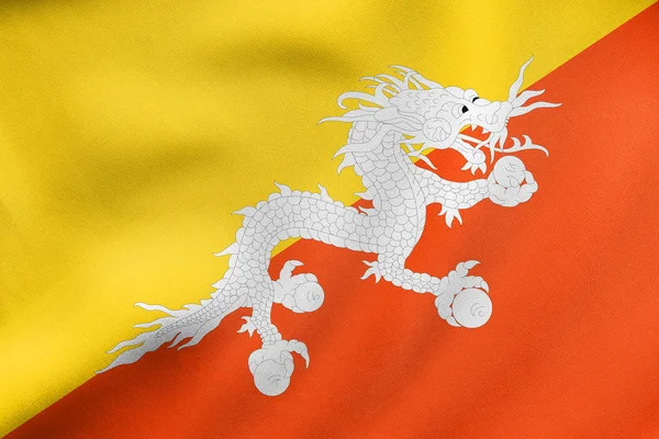 Bandeira do Butão acenando, textura de tecido real — Fotografia de Stock