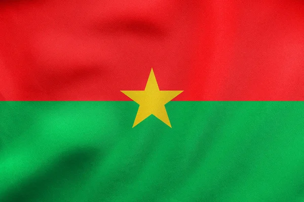 Burkina Faso integetett, valós szövet szerkezete zászlaja — Stock Fotó