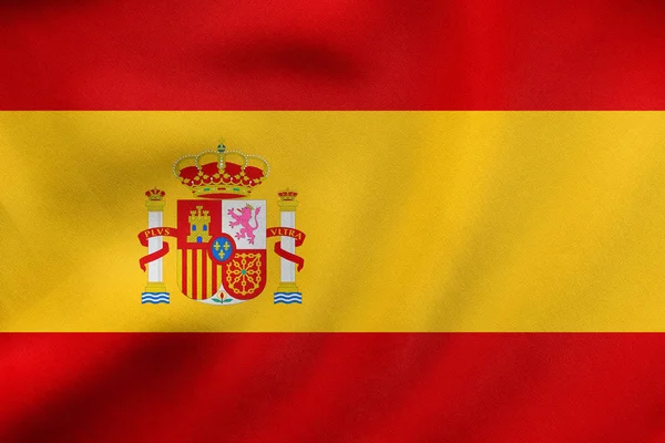 Bandiera della Spagna sventola, tessitura in tessuto reale — Foto Stock