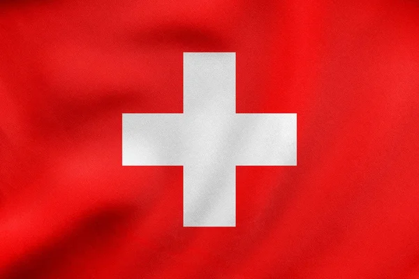 Bandera de Suiza ondeando, textura de tela real — Foto de Stock