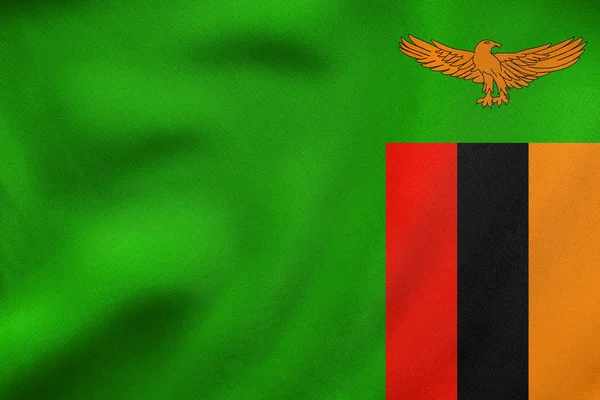 Bandiera dello Zambia sventola, tessitura in tessuto reale — Foto Stock