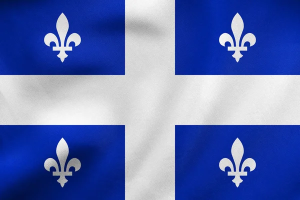 Bandeira de Quebec acenando, textura de tecido real — Fotografia de Stock