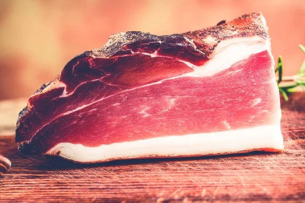 Italian speck smoked prosciutto — Stock Photo, Image