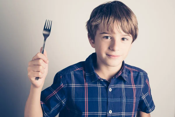 Little boy with fork ready to eat — Stock Photo, Image