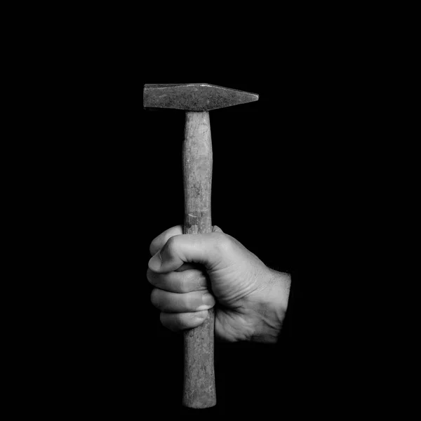 Hammer-Werkzeug in der Hand eines Mannes — Stockfoto