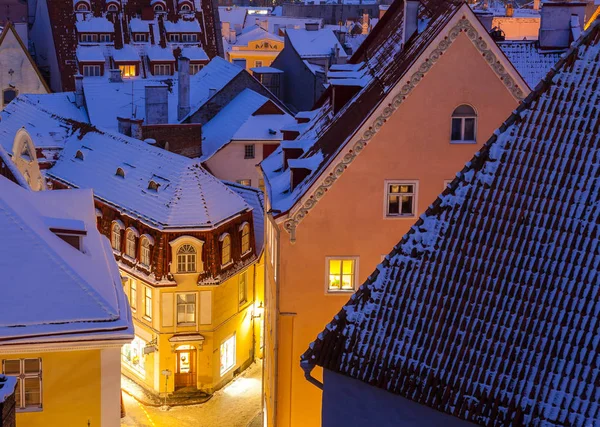 Snowy evening scenic picture of cosy houses