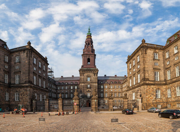 COPENHAGEN, DENMARK - 26 JUNE, 2016: Christiansborg Castle houses the Danish Parliament and the Royal Stables.