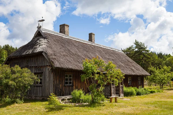 Wooden rural house, Baltic traditions, Latvia Stock Photo