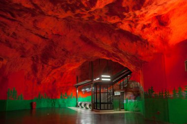 STOCKHOLM, SWEDEN - SEPTEMBER 20, 2016: Solna Station of the Subway, red cave style clipart