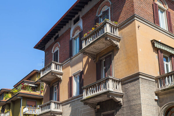 Balcony of old living house. Bergamo, Italy.
