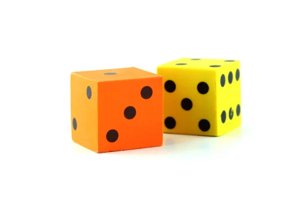 Yellow and Orange rubber dice on white background — Stock Photo, Image