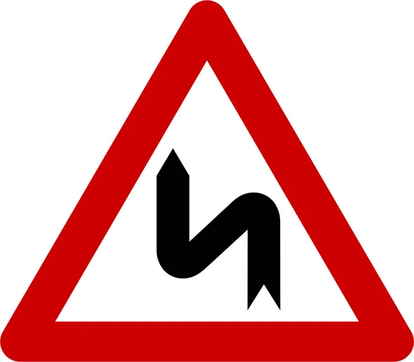 Sinal de aviso com curvas perigosas à esquerda — Fotografia de Stock