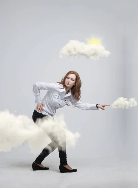 Woman with cloud and sun. Concept on the topic of computer cloud services. — Stock Photo, Image