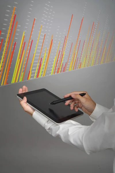 Finance data concept. Man working with Analytics. Chart graph information on digital screen.
