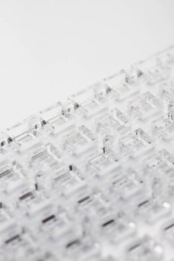 Yüksek teknoloji arka plan. Şeffaf plastik ya da cam delik dışarı kesim ile bir sayfası. Lazer kesim pleksiglas.