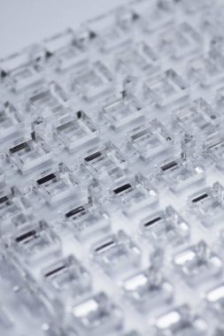 Yüksek teknoloji arka plan. Şeffaf plastik ya da cam delik dışarı kesim ile bir sayfası. Lazer kesim pleksiglas.