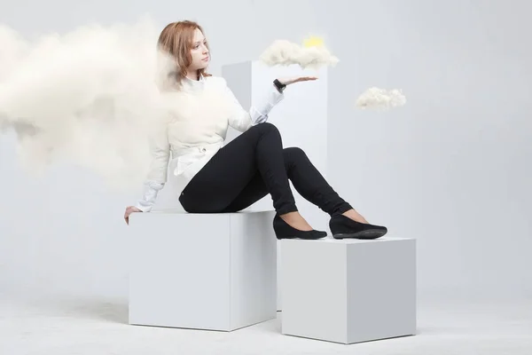 Woman with cloud and sun. Concept on the topic of computer cloud services. — Stock Photo, Image