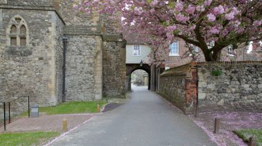 ROCHESTER, UK: Gardens outside the Cathedral with medieval walls and spring colors clipart