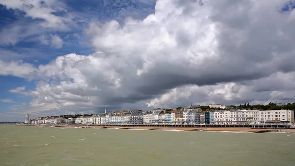 View of the seafront from the Pier with a beautiful cloudy sky, Hastings, UK — Stock Photo, Image