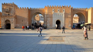 SFAX, TUNISIA - DECEMBER 22, 2019: Bab Diwan, the main entrance gate to the medina of Sfax, with impressive ramparts