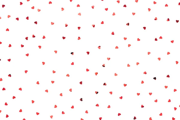 Pequeños corazones rojos sobre fondo blanco — Foto de Stock