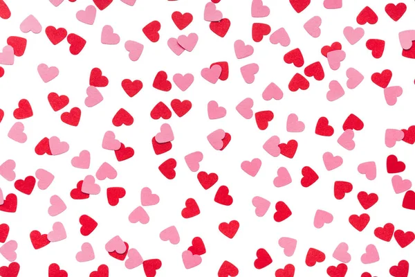 Malá červená srdce na bílém pozadí — Stock fotografie