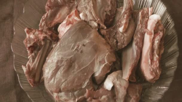 Wild Boar Meat is Spinning on the Plate the Raw Meat — Stock Video