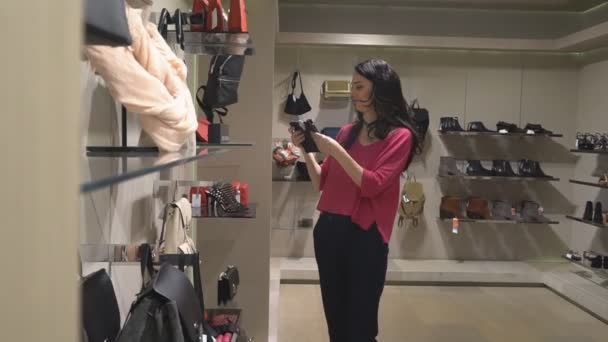 Beautiful Model Selects in the Wardrobe Bag — Stock Video