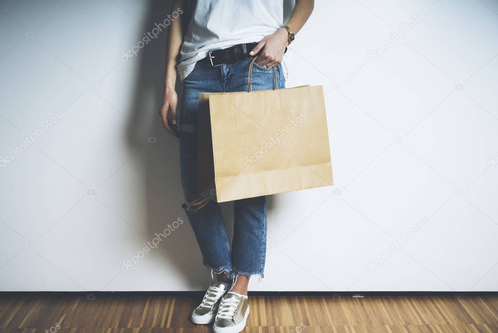 girl holding blank craft package