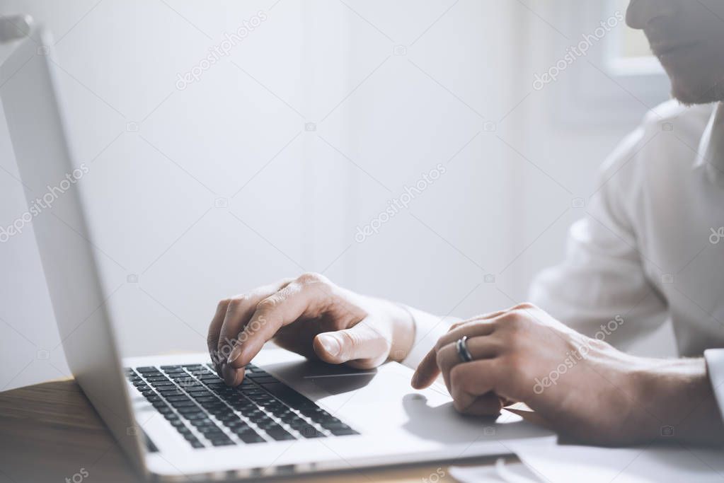 businessman working at office on laptop