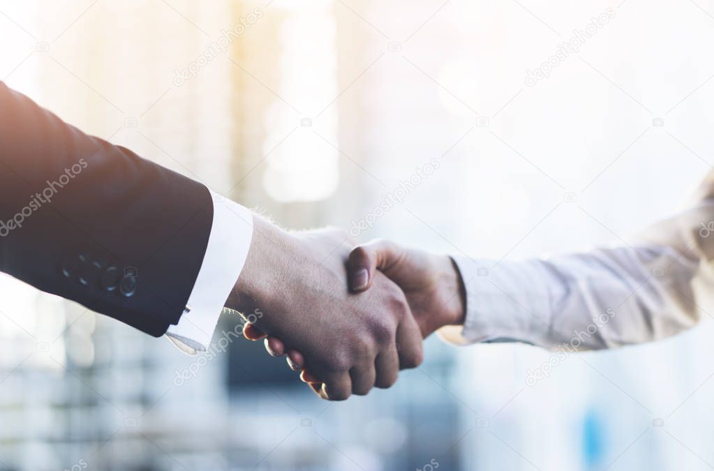 business partners making handshake