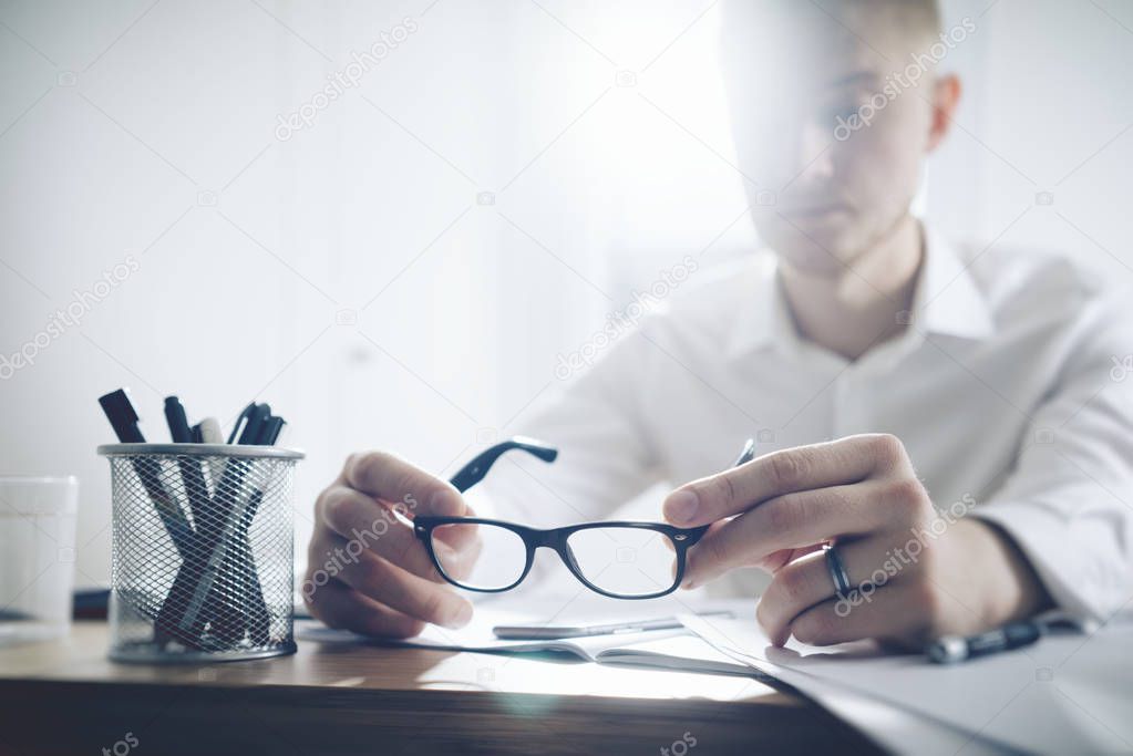 Businessman sitting at his office