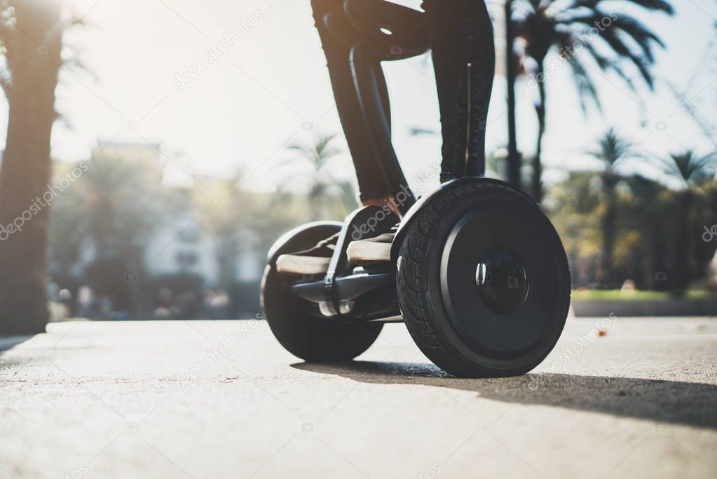 girl standing on electric hoverboard