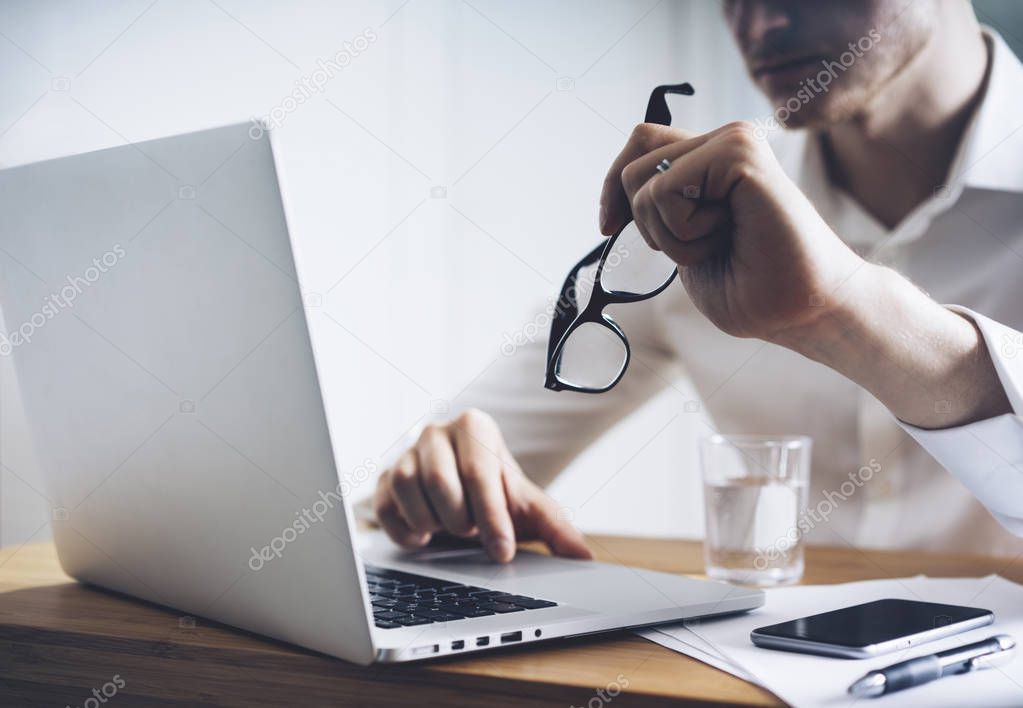 businessman using laptop at office