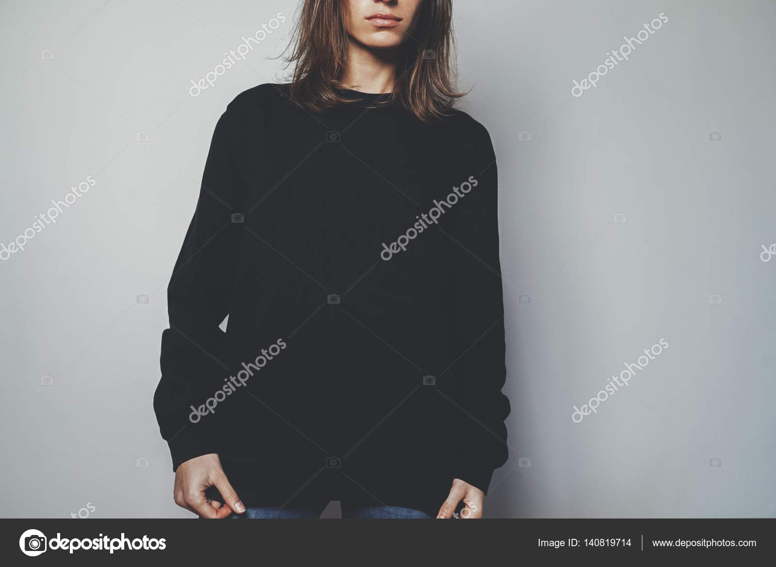 girl wearing oversized hoodie