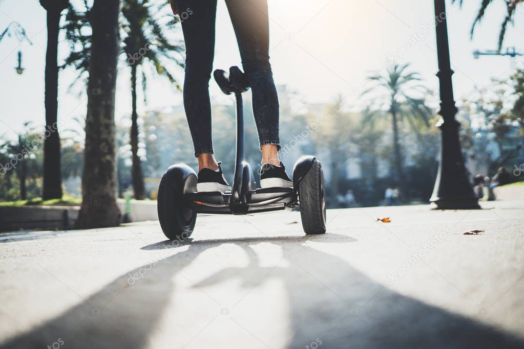 girl balancing on electric hoverboard