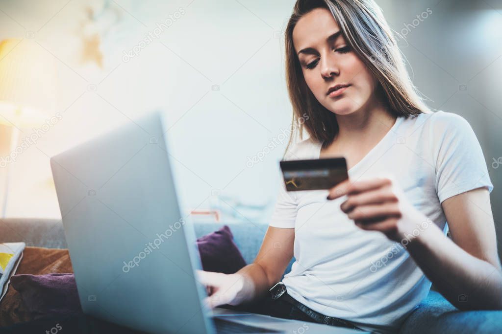 Girl holding credit card 