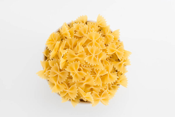 Uncooked macaroni in plate